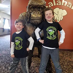 kids standing in front of statue at Kalahari vacation